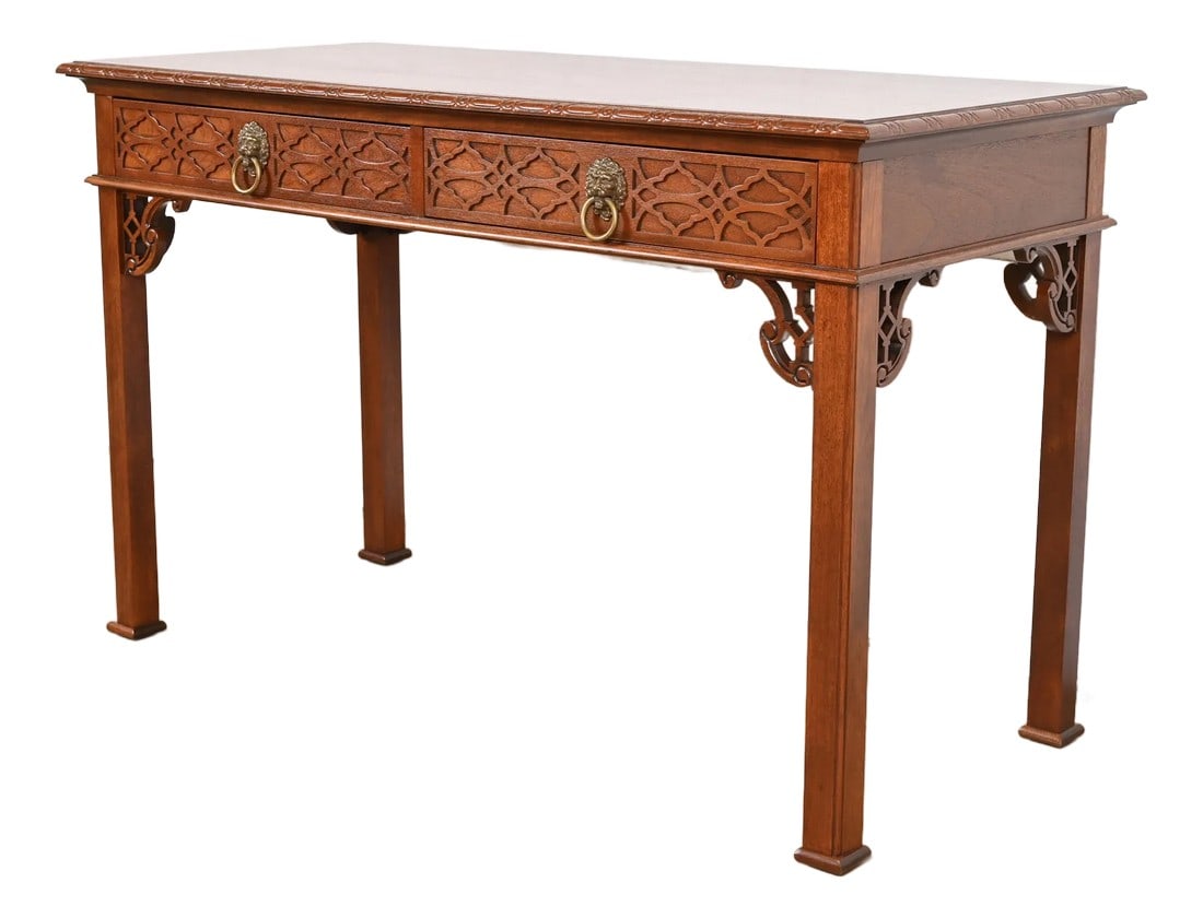 Late 20th Century Baker Furniture Historic Charleston Georgian Carved Mahogany Writing Desk or Conso: A gorgeous Georgian or Chippendale style writing desk, console table, or sofa table By Baker Furniture, "Historic Charleston Collection" USA, Late 20th Century Carved mahogany, with original brass lio