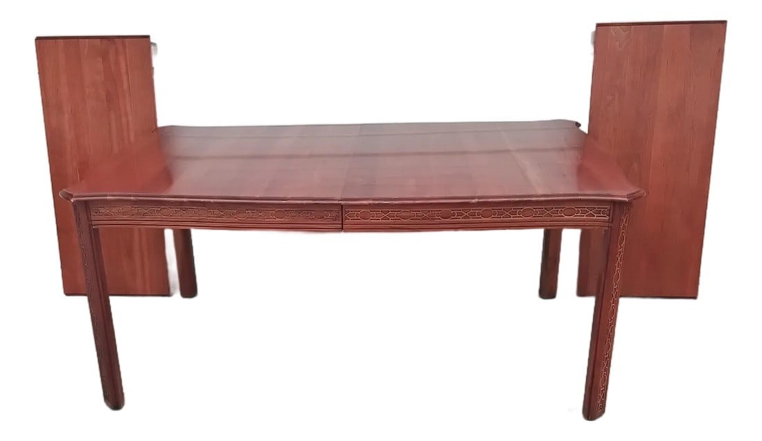 1990s Harden Fretwork Dining Table: Solid natural cherry dining table, finish is adaptable with alot of other chair finishes.this is so versatile, can seat 4, 6, 8, or 10 comfortably. 12 in a pinch. The legs and apron is a gorgeous