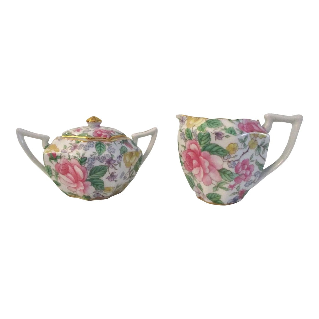 Vintage Pastel Floral Porcelain Creamer & Sugar Bowl Set- 2 Pieces: Pretty white porcelain creamer and lidded sugar bowl featuring a delicate pastel shaded all-over floral motif with gold accents. No maker's mark. Excellent condition. Dimensions: sugar bowl, 5.75"L x