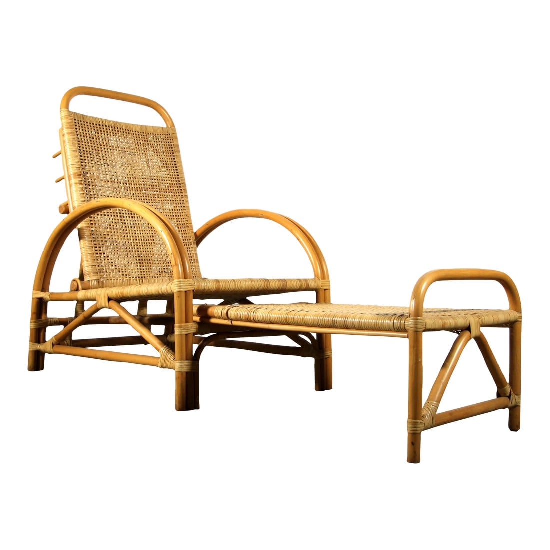 Vintage Bamboo Rattan Adjustable Lounge Chair / Recliner: Vintage c.1950's bamboo lounge chair / recliner! It has a double woven rattan seat and back, very stylish and sturdy, likely French in origin. The foot stool pulls out from the chair seat along a cent
