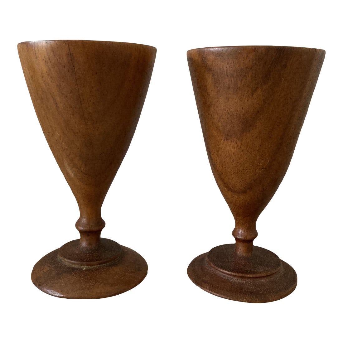 1950s Georges Briard Numbered Handturned Teak Goblets Made in Haiti- a Pair: Stunning set of handturned teak goblets by the renowned Georges Briard. Please see original stamps, affixed to bottom. Made in Haiti in the 1950's, these are smooth and completely useable either as wi