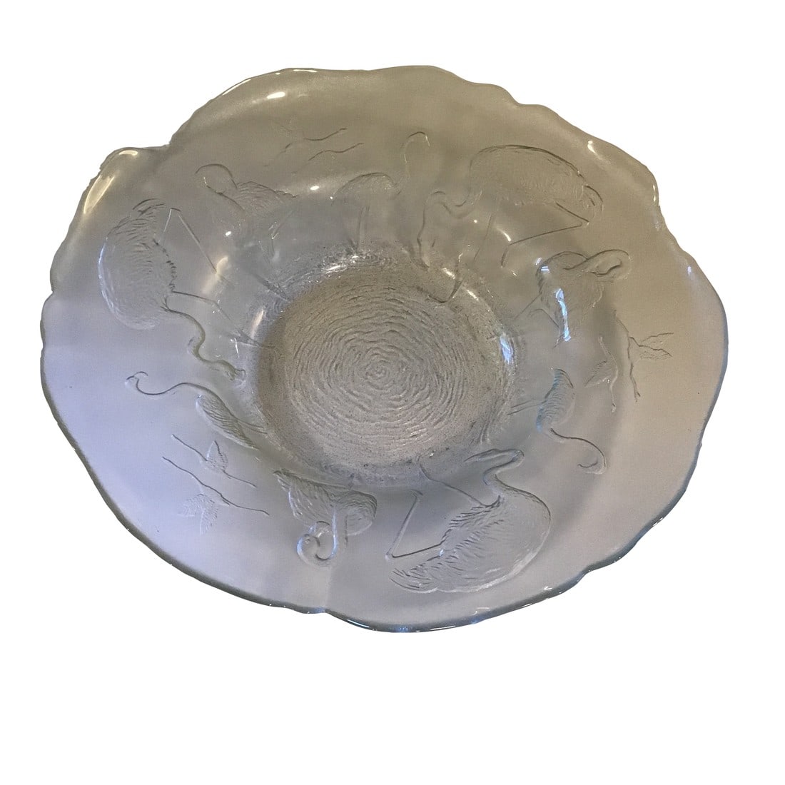 Flamingo Glass Bowl Vintage 1990's Etched Raised Embossed Clear Glass Serving Bowl: Vintage 1990's Flamingo Bowl Beautiful clear glass bowl surrounded by embossed flamingos The bottom of bowl features a rippled effect to make it look like the flamingos are in a pond Very nice