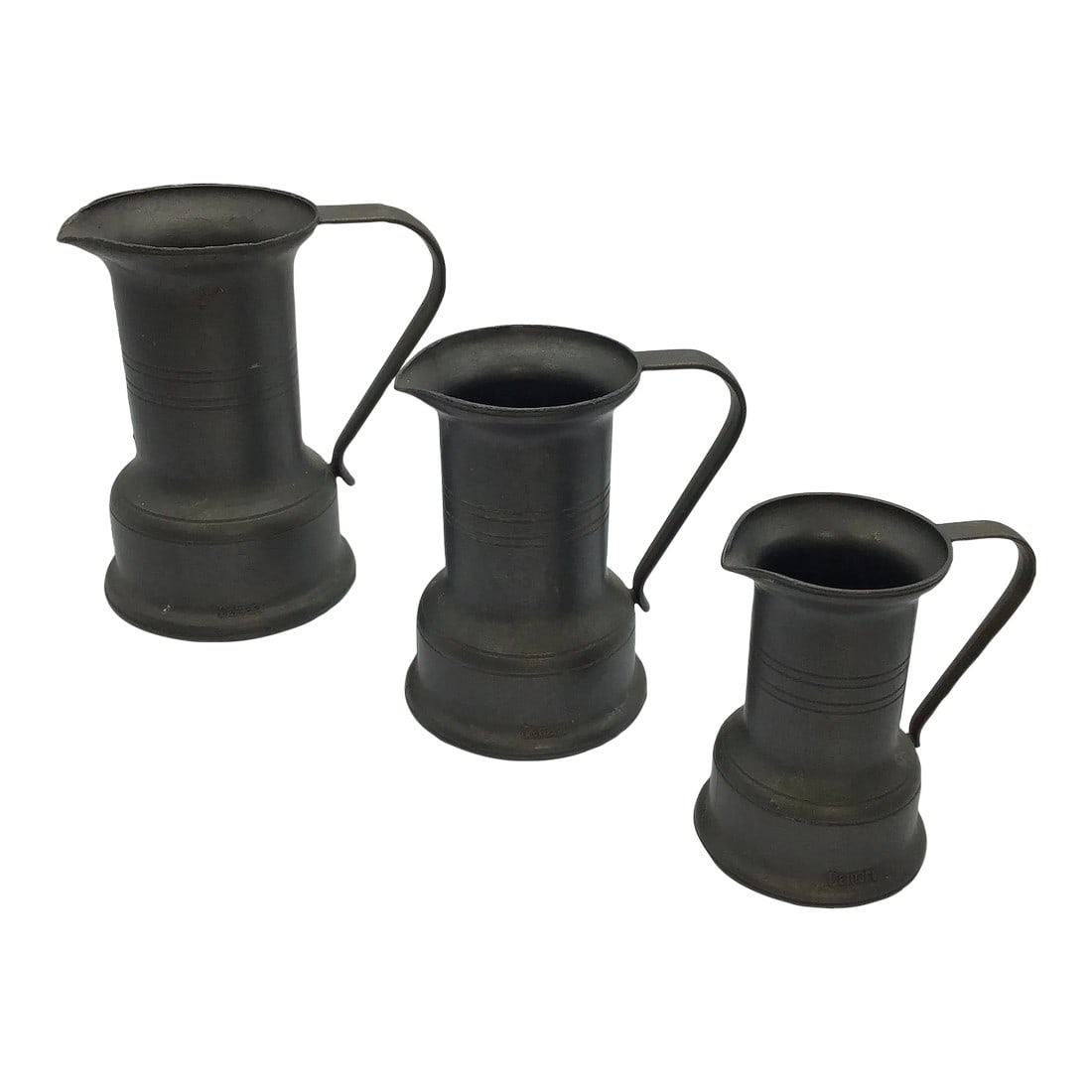 Pewter French Country Pitchers Antique Pitchers French Primitive Pewter Measure Pitchers Damart Fran: Antique French Measuring pewter pitchers Primitive Pewter Pitchers with spout and handles Grayish color pewter Damart France Signed Damart at front base and on the bottom Measure 2.75", 3.75", 4" Use