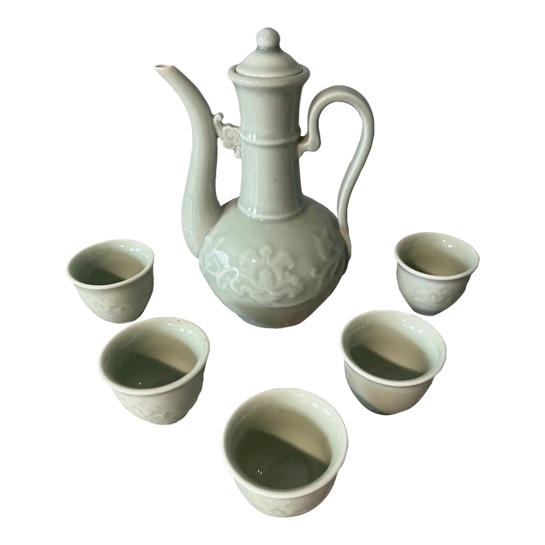 Late 20th Century Celadon Lotus Design Tea Set- 7 Pieces: There is something so special about celadon pottery. This glaze is deep, flawless, no crazing, no chips, cracks, or signs of use. Beautiful addition to your collection, adorned with lotus flowers. 
