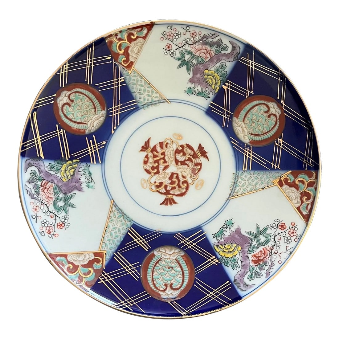 1960s Japanese Gold Imari Style Decorative Footed Bowl: Beautiful bowl, perhaps to be placed on a side table for admiration or even wall mounted. It's detailed without being busy, the color choices, work well together, and the gold ties it all in. I love