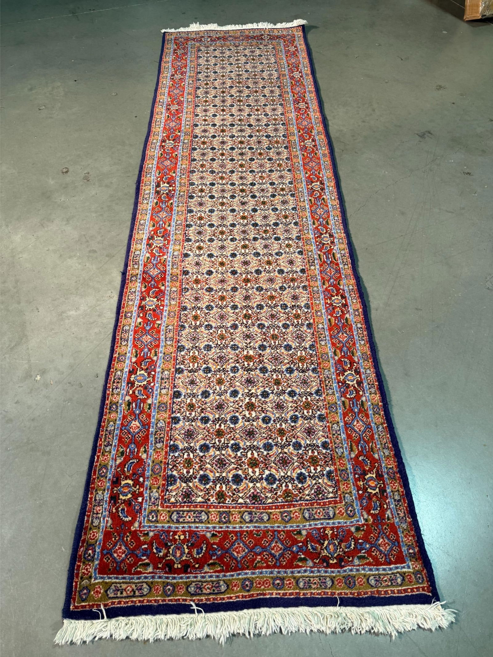 Magnificent Persian Runner 2.8x9.8: Title:Magnificent Persian Runner 2.8x9.8 Description:2'.8"X9'.8" Authentic Persian Mood runner in Ivory and multi accent colors 100% wool Hand knotted in Iran Reserve: $580.00 Shipping: Domestic: