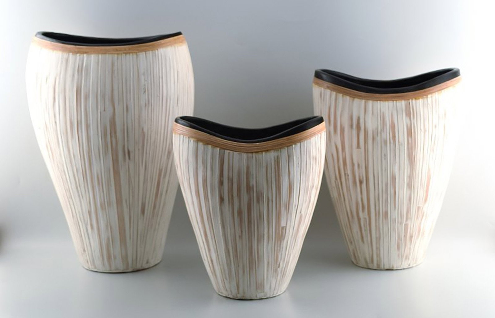 3 large modern pottery vases, light glaze and wickerwork.: Title: 3 large modern pottery vases, light glaze and wickerwork. Description: 3 large modern pottery vases, light glaze and wickerwork. In perfect condition. Unstamped. Largest measures 26 cm. x 42 cm