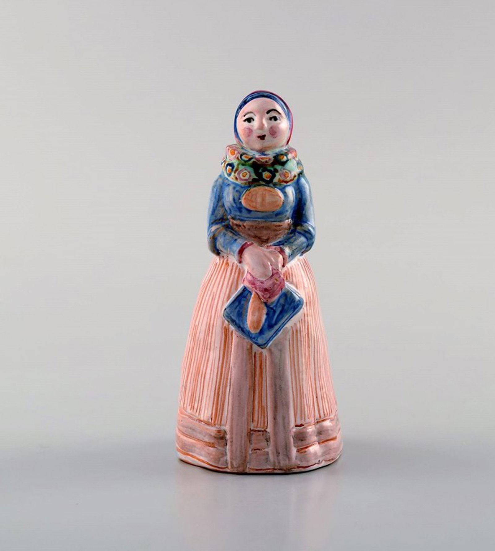 Hjorth (Bornholm) glazed stoneware figure, woman in national costume.: Title: Hjorth (Bornholm) glazed stoneware figure, woman in national costume. Description: Hjorth (Bornholm) glazed stoneware figure, woman in national costume. Measures: 10 x 4.5 cm. Signed: Hjorth.