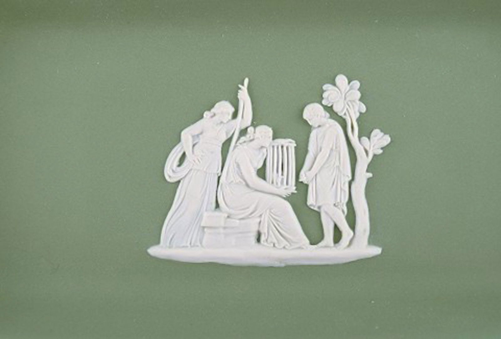 Wedgwood, England. Small square dish in green stoneware with classicist scenes in white. Approx. - 3