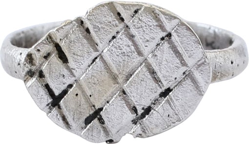 ROMAN RING C.4th-6th CENTURY AD, SIZE 2 ½: Size 4 1/4 for wear on the small finger between the first two joints as was the custom. Silvered bronze with 2.9mm ridged face band with the Roman nub at the bottom. Raised pointed oval bezel with fla