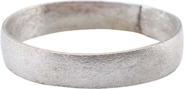 VIKING WOMAN'S WEDDING RING, SIZE 6 ¼: 10th-11th century AD. Gilt bronze Size 6 1/4, 3.5mm width, with near flat face. Surface textured from burial. Vikings exchanged rings on the pommel of the groom's sword. Professionally refurbished wit