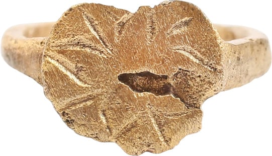ROMAN/BYZANTINE CHRISTENING OR BAPTISM RING, C. 2ND-6TH CENTURY AD, SIZE ½: Gilt bronze, size about ½ which suggests a child of six months age or less. Slightly rounded face band, 1.3mm width flaring to the shoulders. Circular bezel with the four-point Star of Bethlehem
