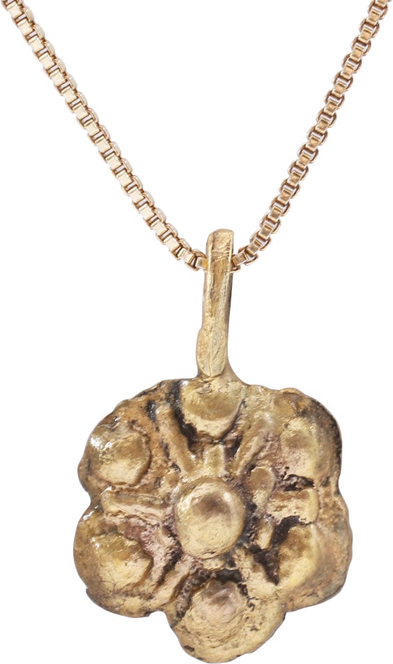 ROMAN WHEEL OF FORTUNE AMULET, 3RD-6TH C.AD,: 3rd-5th Century. Over 1/2" width (0.55"). Raised central hub with six radials forming loops. This form which stylizes the wheel is likely influenced by the introduction of Christianity which blended w