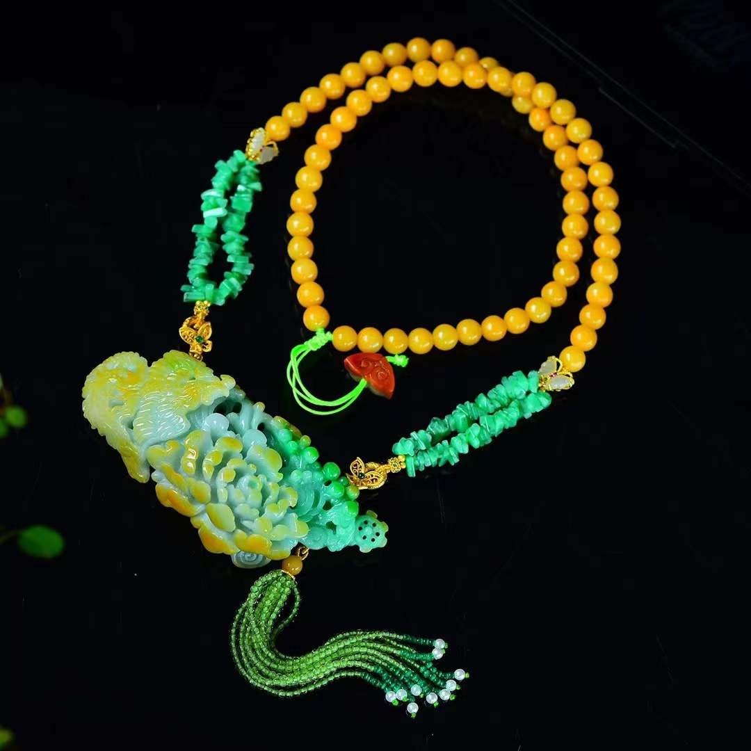 Natural Yellow Green Jadeite Hand-carved Phoenix & Peony Pendant w Certificate: Title: Natural Yellow Green Jadeite Hand-carved Phoenix & Peony Pendant w Certificate Origin: Chinese Date/Period: After2025 Materials: Jadeite Dimensions: 100x40x23(mm) 3.94x1.57x0.91(inches) Reserve