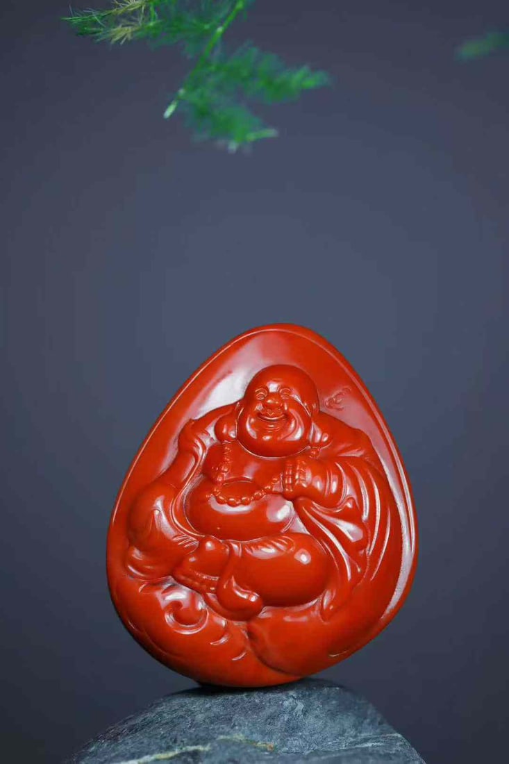 Nanhong Agate Hand-carved Laughing Buddha Pendant w Certificate: Title: Nanhong Agate Hand-carved Laughing Buddha Pendant w Certificate Origin: Chinese Date/Period: After2025 Materials: Nanhong Agate Dimensions: 45.3x37.8x17.8(mm) 1.78x1.49x0.71(inches) Weight 0.09