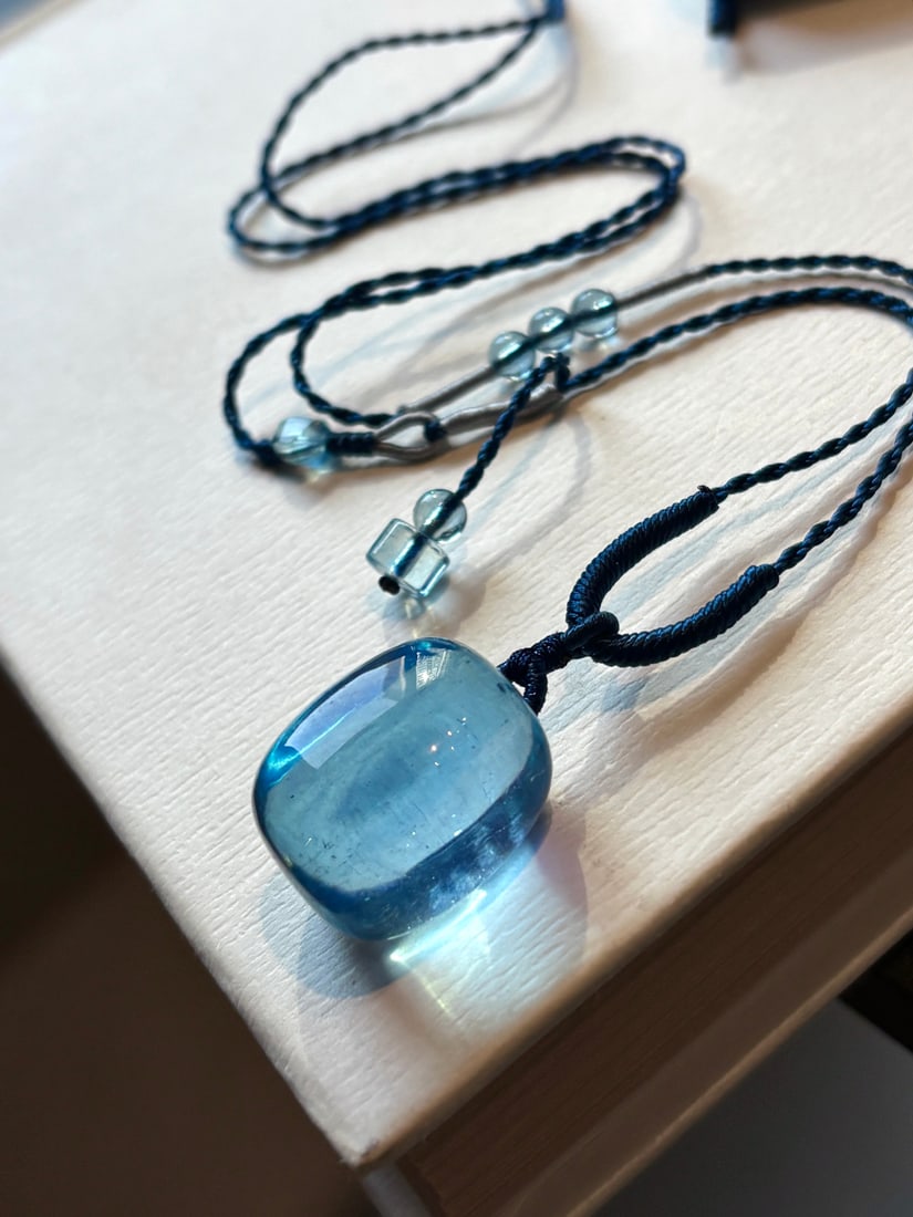 Natural Aquamarine Pendant w Certificate: Title: Natural Aquamarine Pendant w Certificate Origin: Chinese Date/Period: After2025 Materials: Aquamarine Dimensions: 15x12(mm) 0.59x0.47(inches) Weight 0.02 lbs/9.8g Reserve: $199.00 