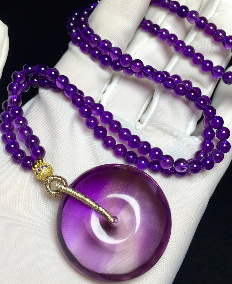 Natural Amethyst Lucky Pendant with Necklace: Title: Natural Amethyst Lucky Pendant with Necklace Origin: Chinese Date/Period: After2024 Materials: Amethyst Dimensions: 34.2x15.5(mm) 1.35x0.61(inches) Weight 0.11 lbs/48g Reserve: $685.00 Shippin