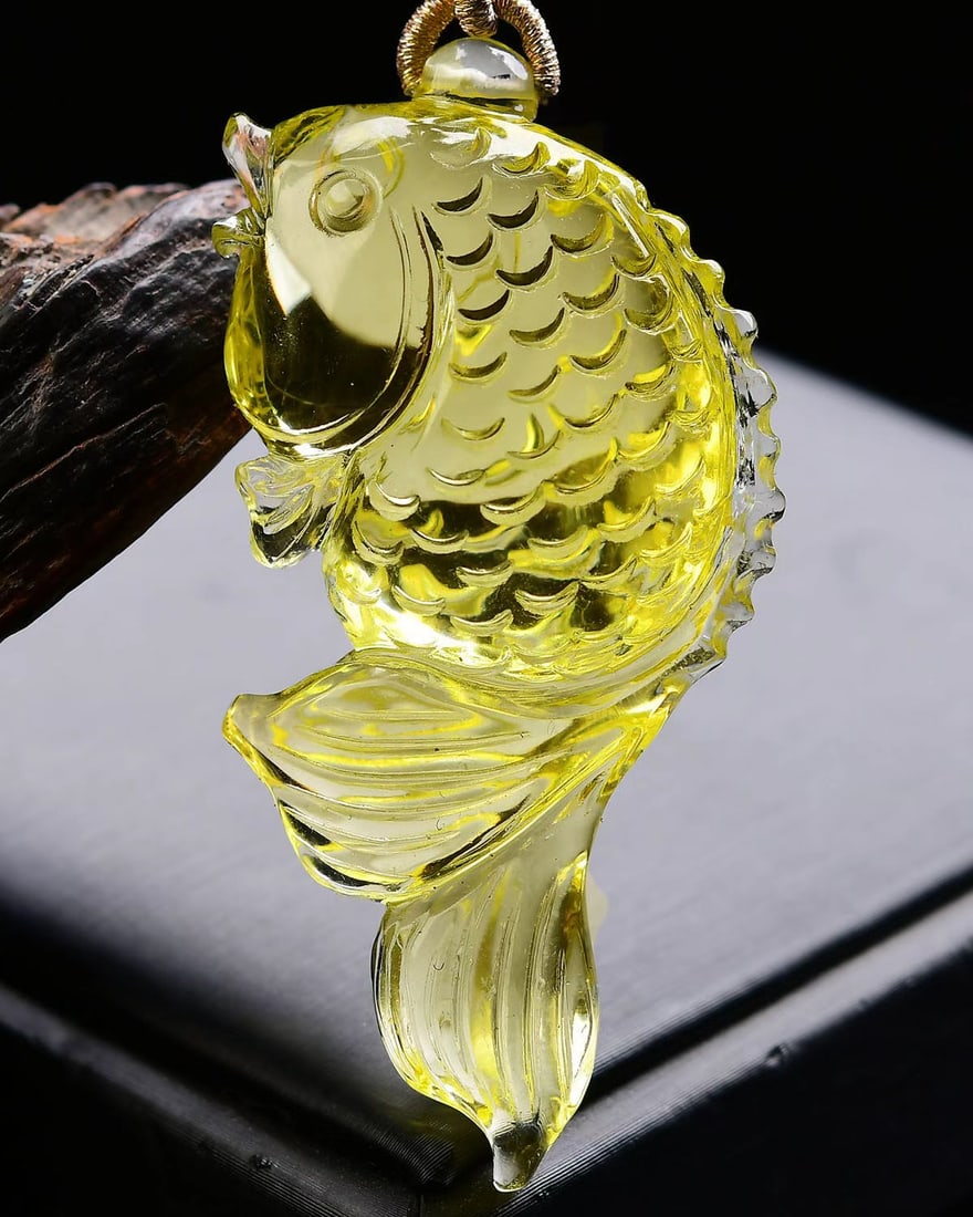 Yellow Crystal Pendant - Fish: Title: Yellow Crystal Pendant - Fish Origin: Chinese Date/Period: After2025 Materials: Crystal Dimensions: 64x31x15(mm) 2.52x1.22x0.59(inches) Weight 0.14 lbs/64g Reserve: $199.00 Shipping: Do