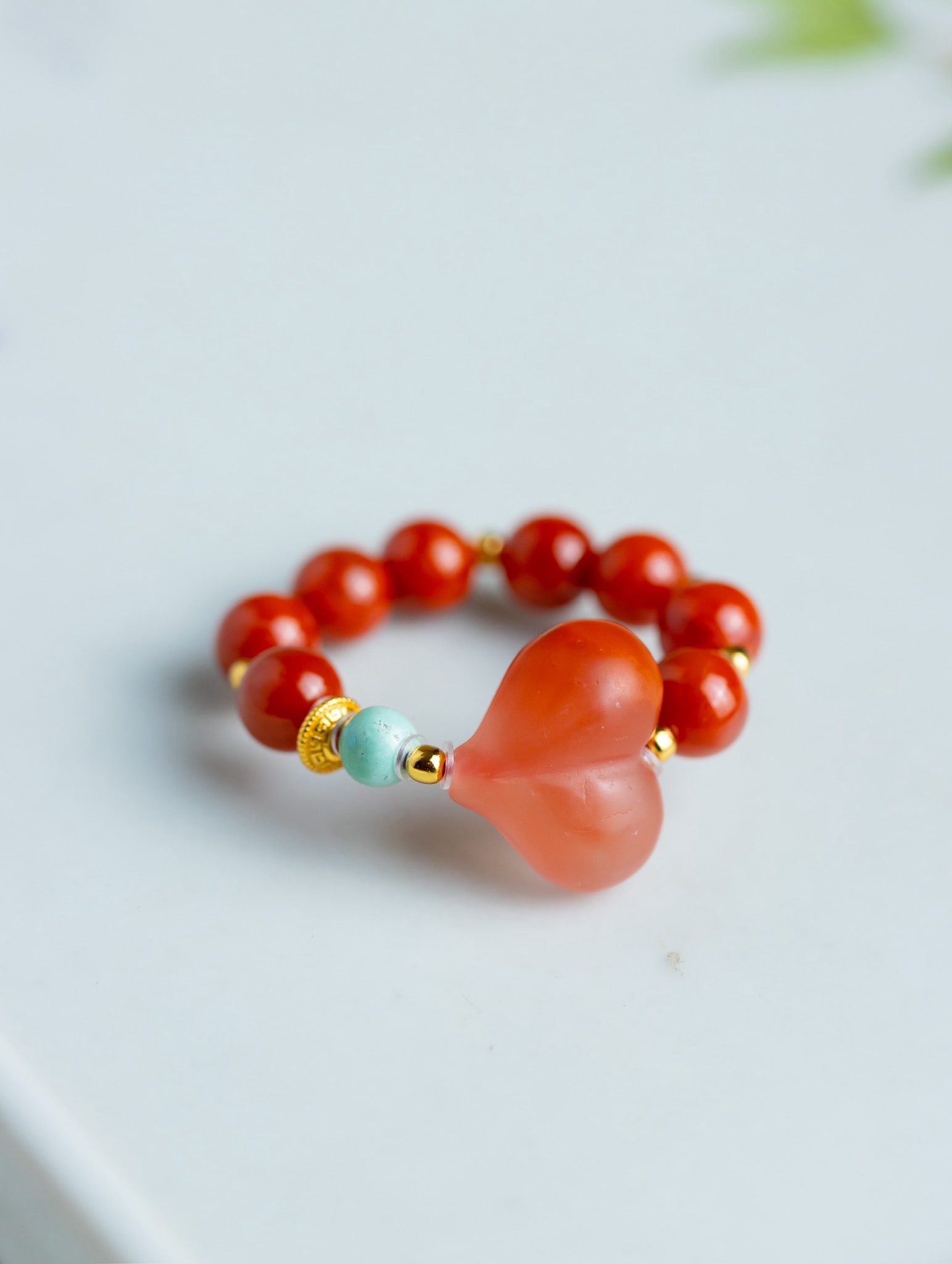 Nanhong Agate Heart-shaped Ring: Title: Nanhong Agate Heart-shaped Ring Origin: Chinese Date/Period: After2025 Materials: Nanhong Agate Dimensions: Reserve: $80.00 Shipping: Domestic: Shipping rates are determined by destination