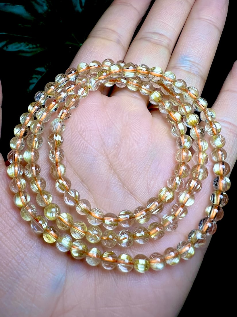 5mm Natural Rutilated Quartz Beads Hand Chain: Title: 5mm Natural Rutilated Quartz Beads Hand Chain Origin: Chinese Date/Period: After2026 Materials: Rutilated Quartz Dimensions: 5(mm) 0.20(inches) Weight 0.05 lbs/20.5g Reserve: $399.00 Shipping: