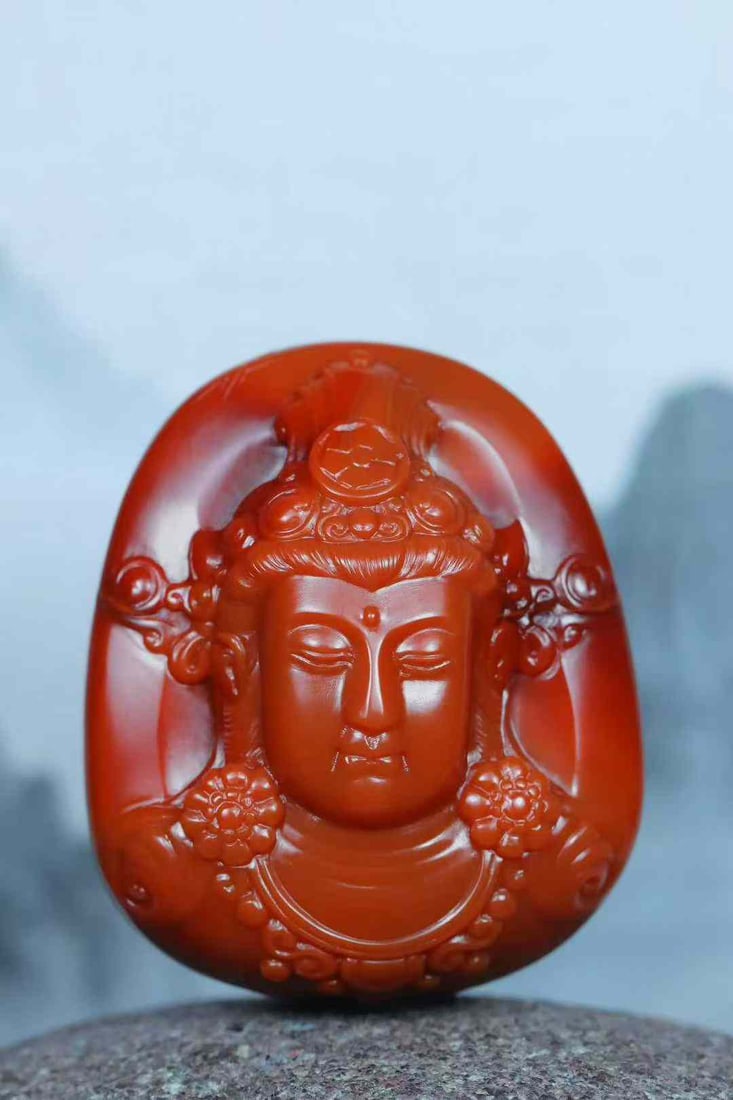 Natural Nanhong Agate Hand-Carved Kwan-yin Pendant with Necklace: Title: Natural Nanhong Agate Hand-Carved Kwan-yin Pendant with Necklace Origin: Chinese Date/Period: After2026 Materials: Nanhong Agate Dimensions: 40.5x34x20.8(mm) 1.59x1.34x0.82(inches) Weight 0.09