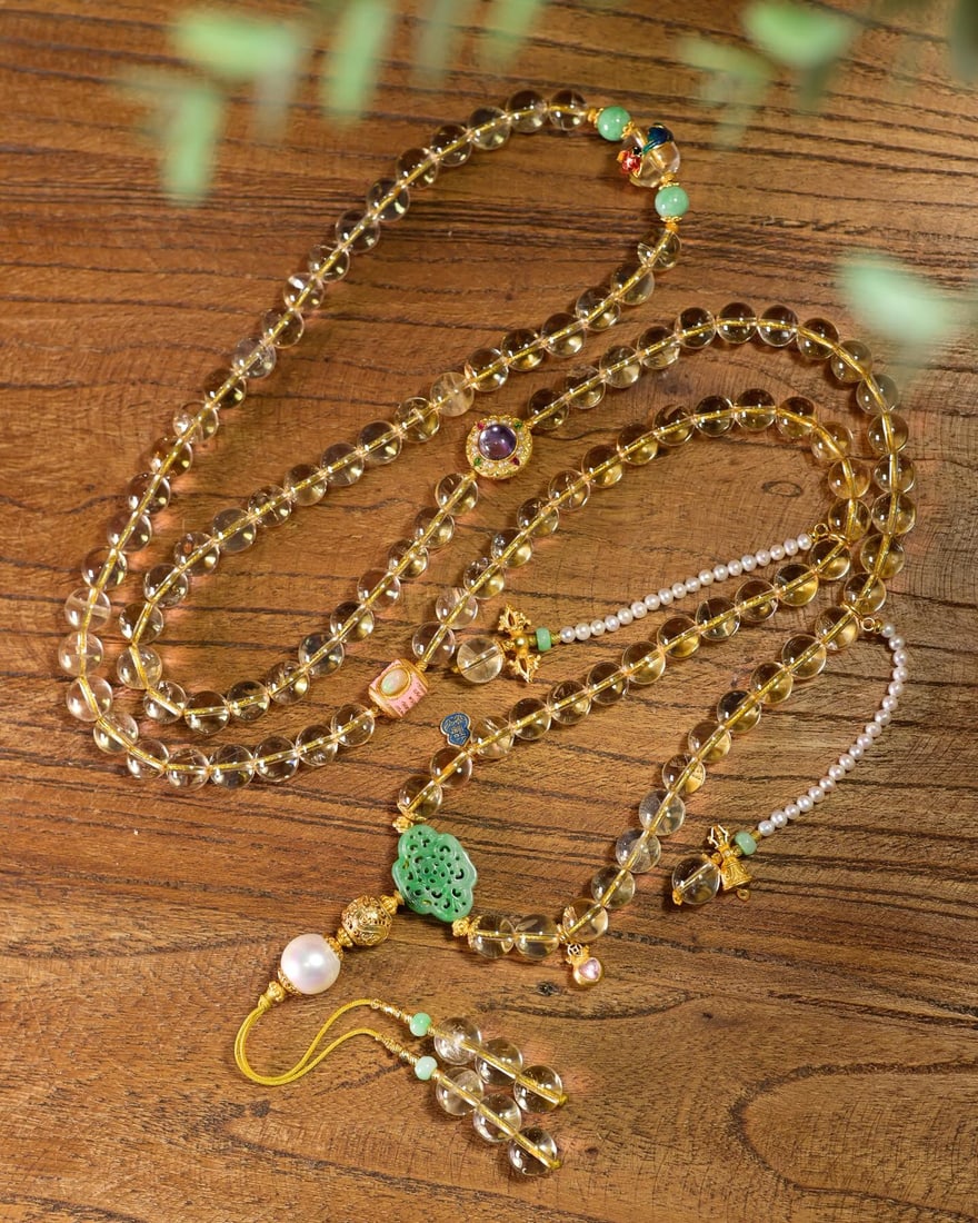 Yellow Crystal,Jadeite,Pearl,Silver Necklace: Title: Yellow Crystal,Jadeite,Pearl,Silver Necklace Origin: Chinese Date/Period: After2026 Materials: Yellow Crystal,Jadeite,Pearl,Silver Dimensions: 9(mm) 0.35(inches) Reserve: $1,499.00 Shipping: