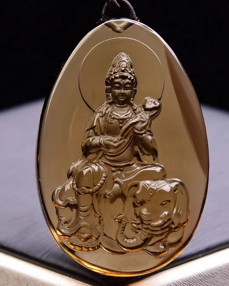 Citrine Hand-Carved Samantabhadra & Elephant Pendant: Title: Citrine Hand-Carved Samantabhadra & Elephant Pendant Origin: Chinese Date/Period: After2025 Materials: Citrine Dimensions: 54x36x18(mm) 2.13x1.42x0.71(inches) Weight 0.10 lbs/47g Reserve: $158.