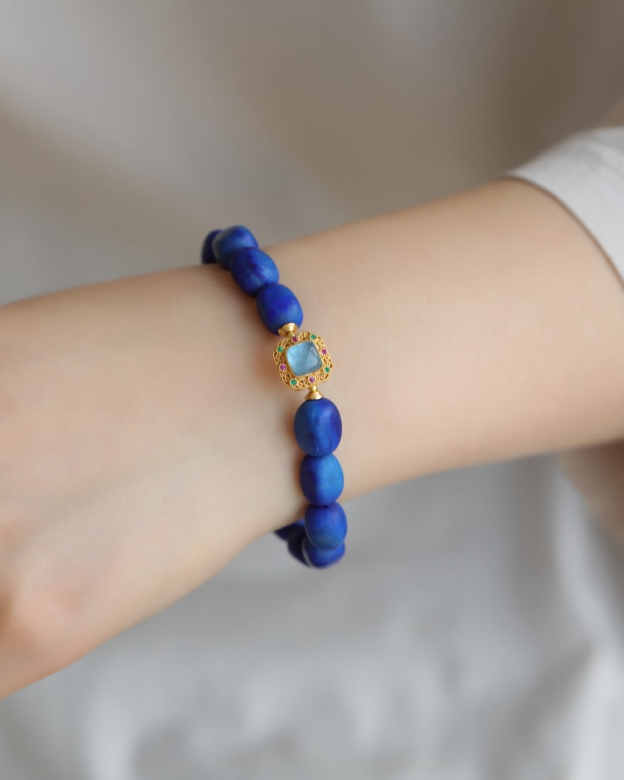 Lapis Lazuli & Silver Inlay Aquamarine Hand Chain: Title: Lapis Lazuli & Silver Inlay Aquamarine Hand Chain Origin: Chinese Date/Period: After2025 Materials: Lapis Lazuli,Silver,Aquamarine Dimensions: 8.5(mm) 0.33(inches) Reserve: $199.00 Shipping: