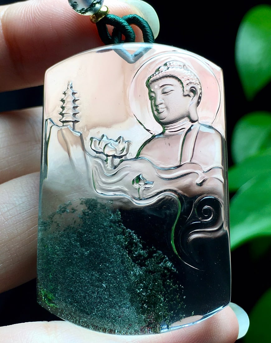 Green Crystal Hand-Carved Buddha Pendant w Certificate: Title: Green Crystal Hand-Carved Buddha Pendant w Certificate Origin: Chinese Date/Period: After2026 Materials: Crystal Dimensions: 48.5x32x16.2(mm) 1.91x1.26x0.63(inches) Weight 0.11 lbs/48.2g Reserv