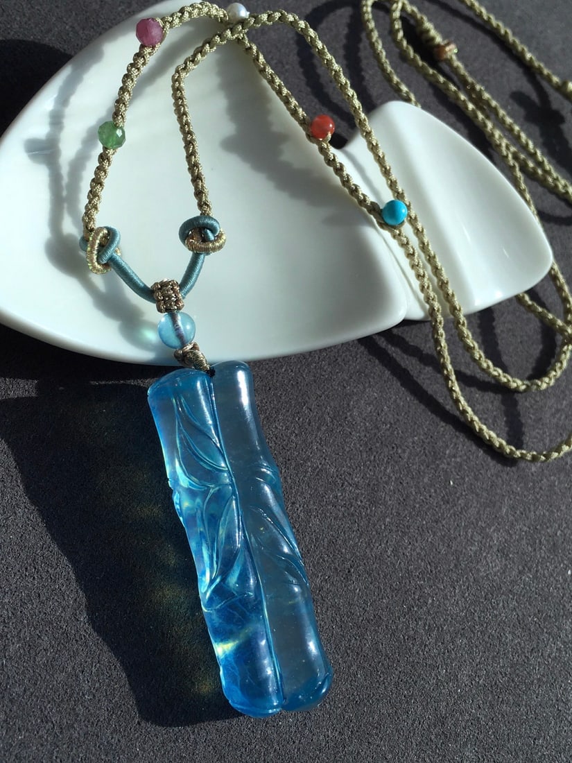 Natural Aquamarine Hand-Carved Bamboo Pendant: Title: Natural Aquamarine Hand-Carved Bamboo Pendant Origin: Chinese Date/Period: After2025 Materials: Aquamarine Dimensions: 43.9x14x9.2(mm) 1.73x0.55x0.36(inches) Weight 0.03 lbs/11.8g Reserve: $220