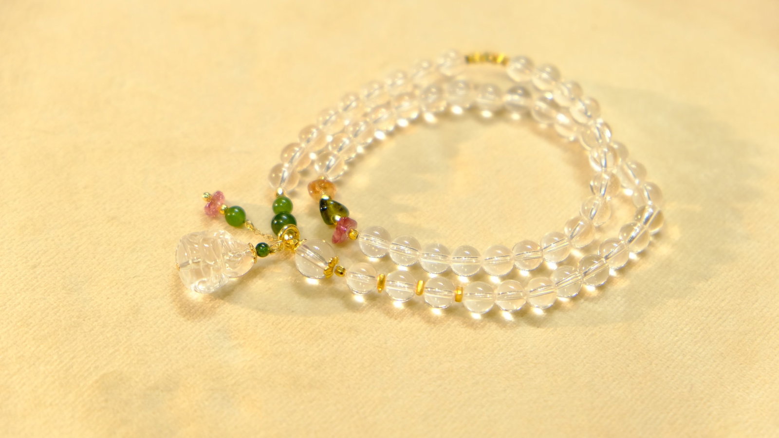 White Crystal & Tourmaline Hand Chain: Title: White Crystal & Tourmaline Hand Chain Origin: Chinese Date/Period: After2025 Materials: Crystal ,Tourmaline Dimensions: 6(mm) 0.24(inches) Reserve: $99.00 Shipping:Domestic: Shipping