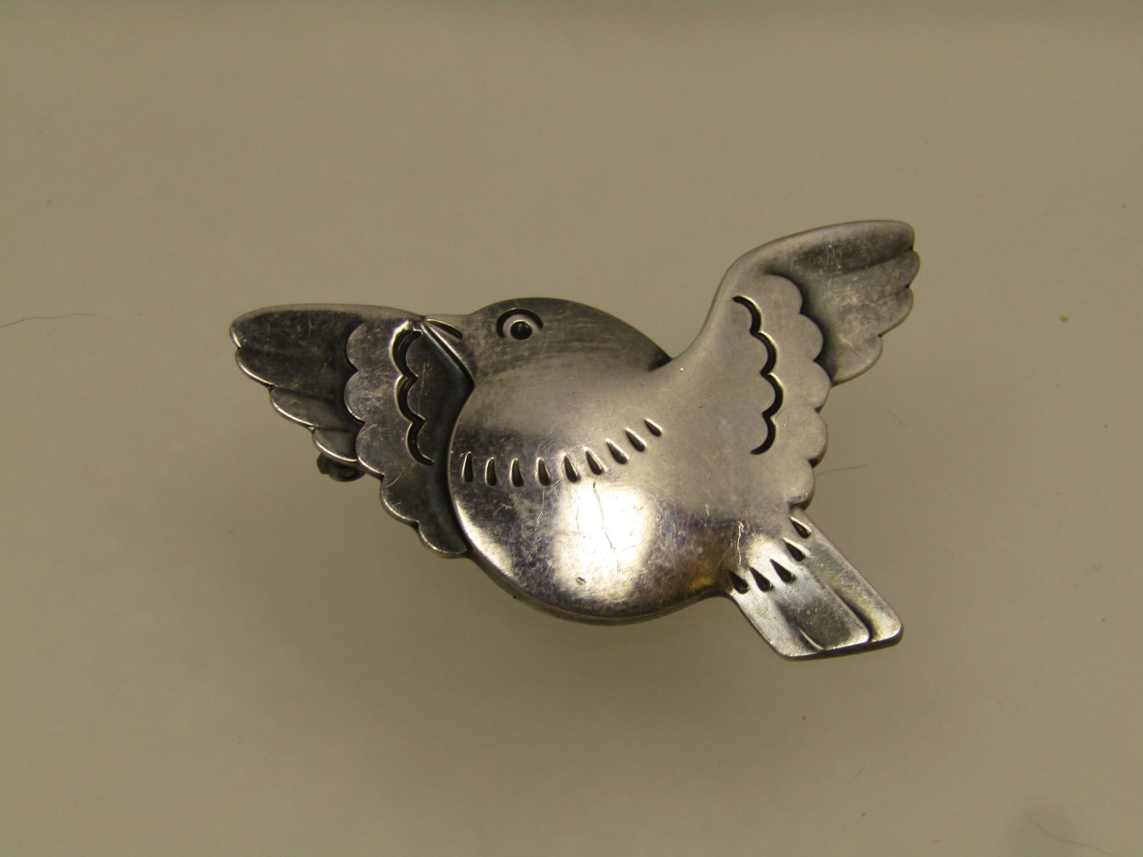 Vintage Sterling Bird Brooch, Georg Jensen, Denmark, 1950's: Vintage Sterling Bird Brooch, Georg Jensen, Denmark, 1950's. The Georg Jensen 320 Bird Brooch was designed by Arno Malinowski around the year 1953. This sterling silver brooch, designed in the form of
