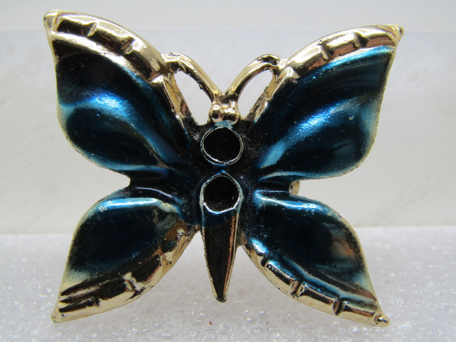 Vintage Aqua Enameled Butterfly Brooch, Two Topaz Rhinestones, 1970's: Vintage Aqua Enameled Butterfly Brooch, Two Topaz Rhinestones, 1970's. This is appx. 1-7/8" wide and 1-1/8" tall. Gold tone but in some lights looks silver tone. Good condition. It is not signed by th