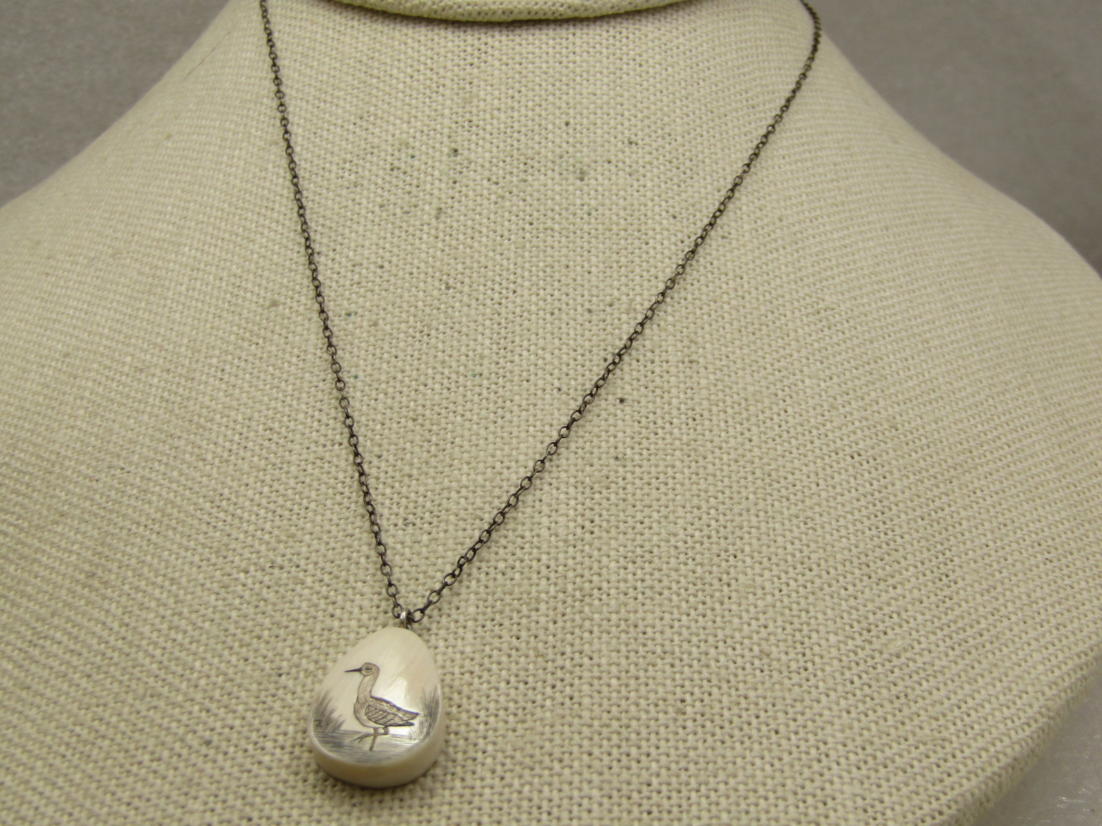Vintage Sterling Seagull Scrimshaw Necklace, 16", Handmade: Vintage Sterling Seagull Scrimshaw Necklace, 16", Handmade. Appx. 1950's-1960's. The chain is definitely 1950's or earlier. The pear-shaped pendant that is appx. 3/4" with bail appears to be