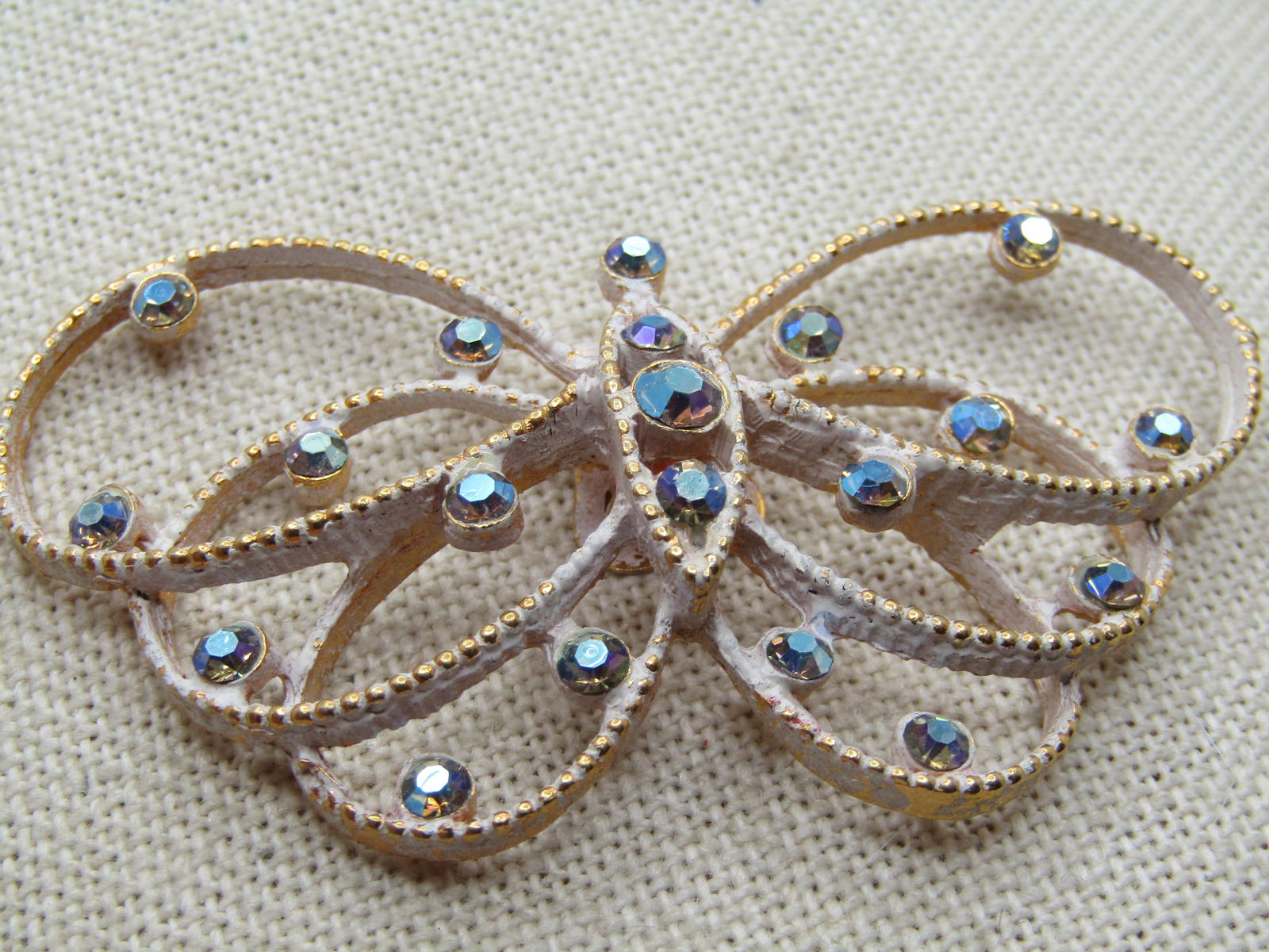 Vintage Rhinestone Butterfly Dress Clip, White Enameling, 1950's-1960's. It is appx. wide and 1.25" - 3