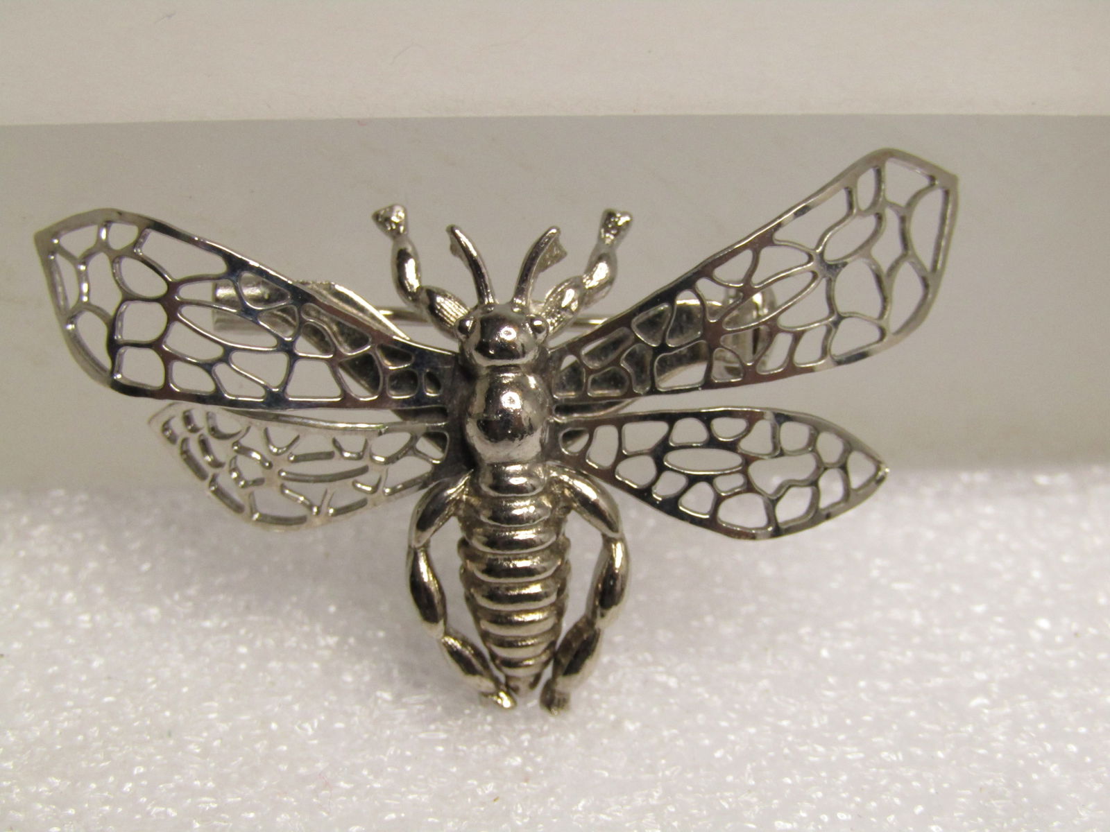 Vintage Silver Tone Bee/Wasp Brooch, 1960's-1970's, Large: Vintage Silver Tone Bee/Wasp Brooch, 1960's-1970's, Large, at 1-7/8" wide and 12" tall - often bee brooches are petite. This is silver tone with curved filigree wings and a ridged torso to tail. Locki