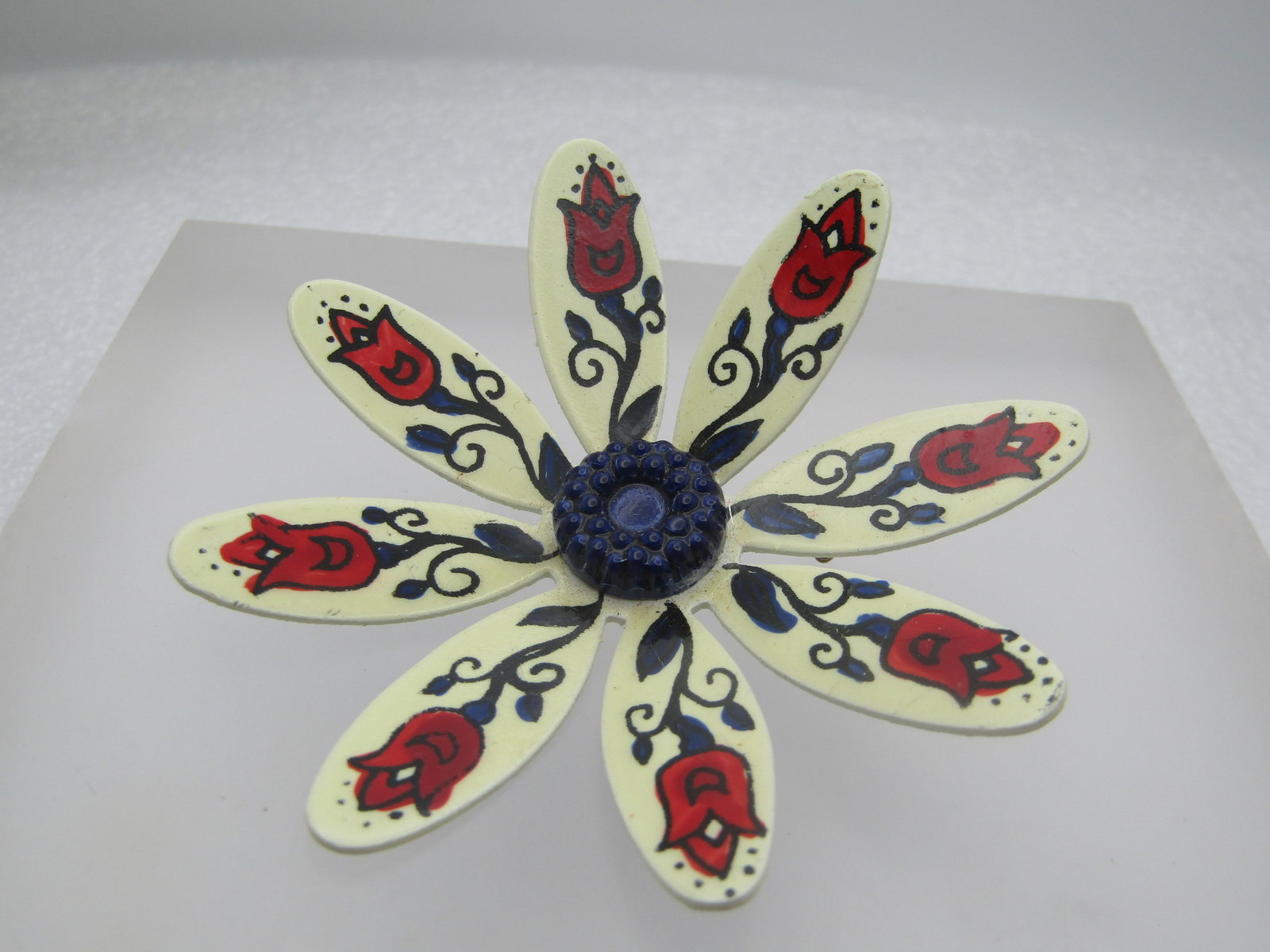 Vintage Painted Floral Brooch, Tulips, Made in Germany, Mid-Century, 2.5": Painted Floral Brooch, Tulips, Made in Germany, Mid-Century, 2.5". White enameled daisy style blossom with a raised blue plstic center and hand painted red tulips with stems and leaves done in red and