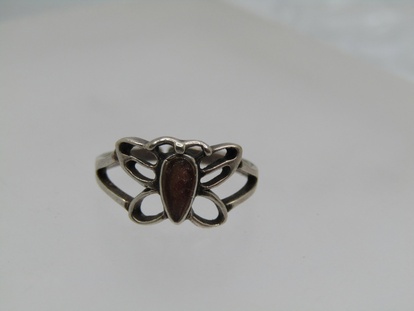Vintage Sterling Enameled Butterfly Toe Ring, Adj. Sz 2.5 - 6: Vintage Sterling Enameled Butterfly Toe Ring, Adj. Sz 2.5 - 6. This butterfly has a peachish enameled body with open work wings and sides. It is appx. 8mm down the finger on top and tapers to appx. 1.