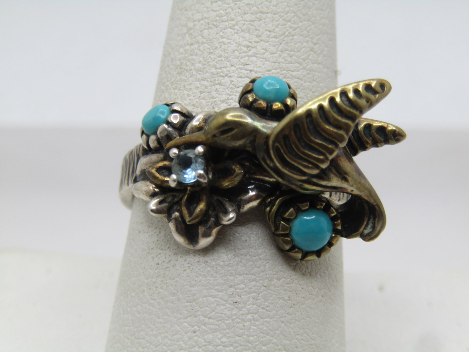 Vintage Sterling Southestern Turquoise Topaz Hummingbird Ring, Sz. 9.25, Carolyn Pollack, Fritz,: Vintage Sterling Southestern Turquoise Topaz Hummingbird Ring, Sz. 9.25, Carolyn Pollack Relios. Marked and tests as sterling with a weight of appx. 9.29 grams. It has three bezel-set turquoise snakey