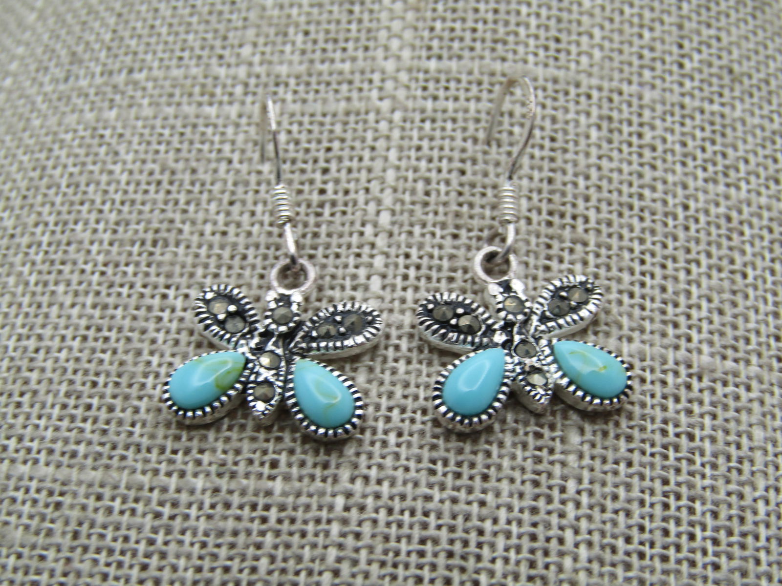 Sterling Marcasite Butterfly Earrings, Faux Turquoise, Pierced, 1990's, Signed: Sterling Marcasite Butterfly Earrings, Faux Turquoise, Pierced, 1990's, Signed MJ. They are marked .925 and test as sterling too with a weight of appx.2.49 gr. They have teardrop faux turquoise caboch