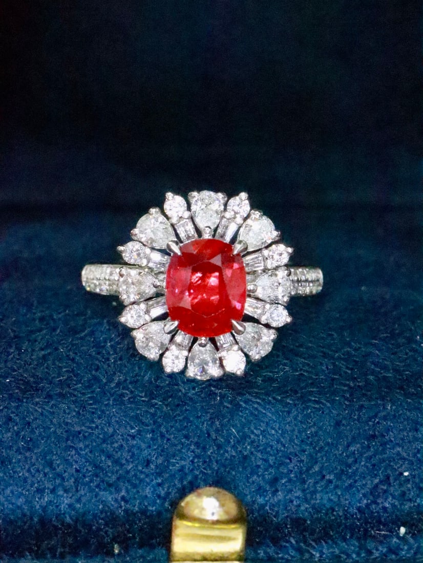 PT950 Platinum Ruby Ring: Title: PT950 Platinum Ruby Ring Description: This exquisite Platinum Ruby Ring is a true testament to luxury and elegance. The 1.53ct vivid red ruby, known for its eye-catching brilliance and passiona