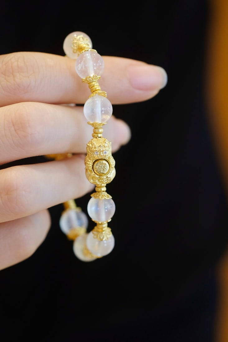 Moonstone Bracelet: Title: Moonstone Bracelet Description: This moonstone bracelet is a remarkable piece known for its ability to stabilize emotions, offering a soothing presence to calm the heart and enhance clarity of