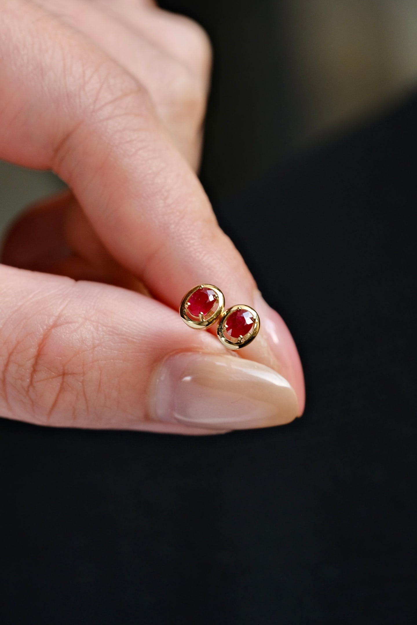 18K Gold Ruby Earrings: Title: 18K Gold Ruby Earrings Description: This pair of 18K Gold Ruby Earrings captures the essence of timeless elegance and sophistication. The natural pigeon blood red rubies are set in a classic ov