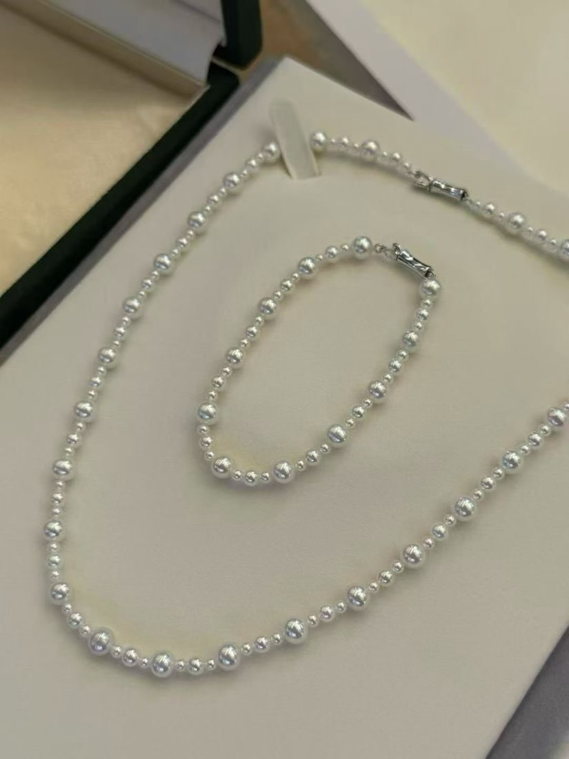 Silver Freshwater Pearl Necklace/Bracelet: Title: Silver Freshwater Pearl Necklace/Bracelet Description: This exquisite piece features lustrous freshwater pearls that range from 3 to 6mm, offering a near-round shape and strong luster with