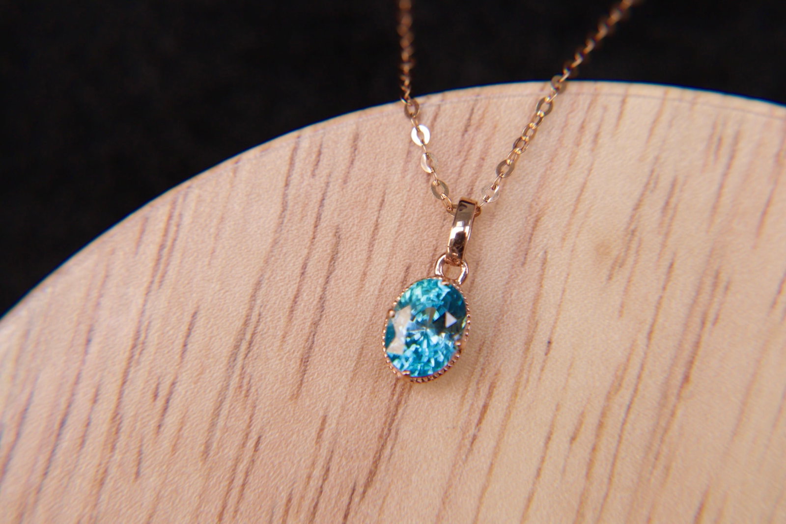 18K Gold Zircon Pendant: Title: 18K Gold Zircon Pendant Description: This 18K Gold Zircon Pendant is an exquisite piece that captures the essence of elegance and sophistication. The natural colored zircon, weighing 1.15