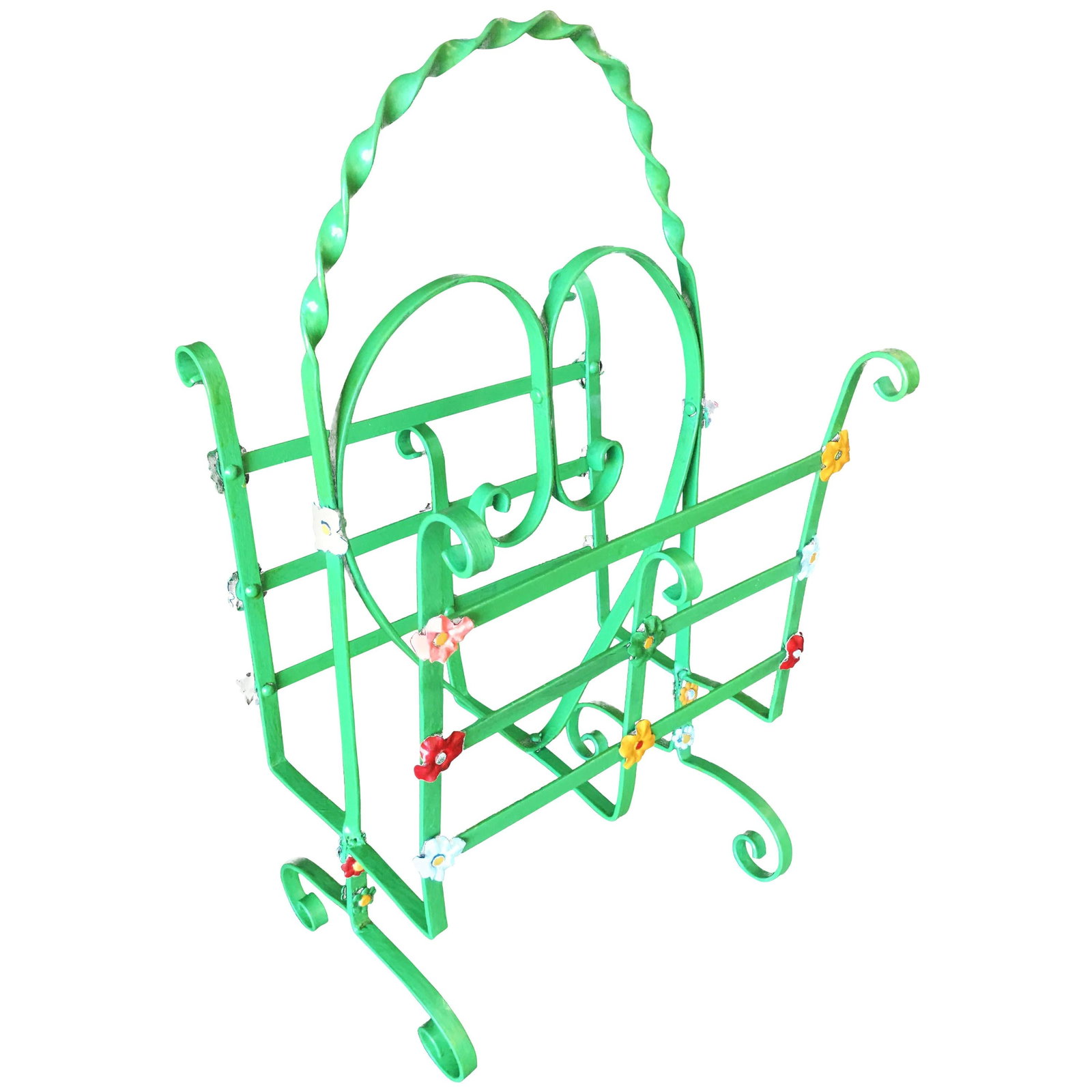 Wrought Iron Heart Floral Accent Magazine Stand: Title: Wrought Iron Heart Floral Accent Magazine Stand Description: Midcentury era magazine wrought iron stand with twist accents, decorative heart center, and floral pattern throughout, circa 1950.