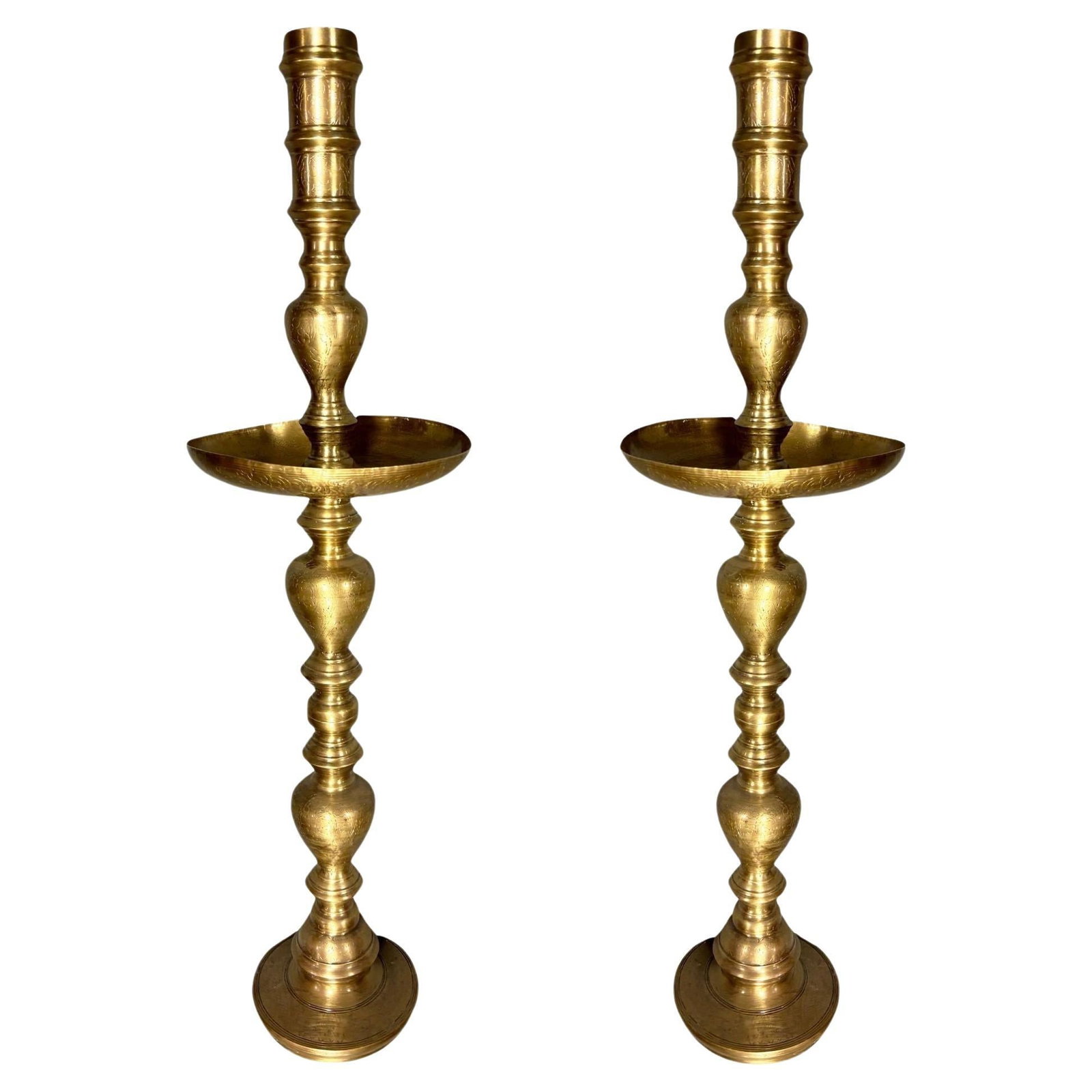 Hand Etched Brass Moroccan Floor Candelabra, Pair: Title: Hand Etched Brass Moroccan Floor Candelabra, Pair Description: Pair of 3' foot of Post War Monumental Moroccan Brass Pillar Floor Candle Holders with hand-etched geometric patterns. This