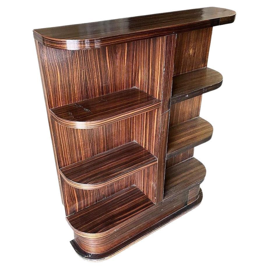 Rare Streamline Art Deco Tiger Ebony Wood Book Shelf: Title: Rare Streamline Art Deco Tiger Ebony Wood Book Shelf Description: Rare Custom-Made Streamline Art Deco Tiger Ebony Book Shelf showcases luxurious craftsmanship with its sleek, streamlined desig