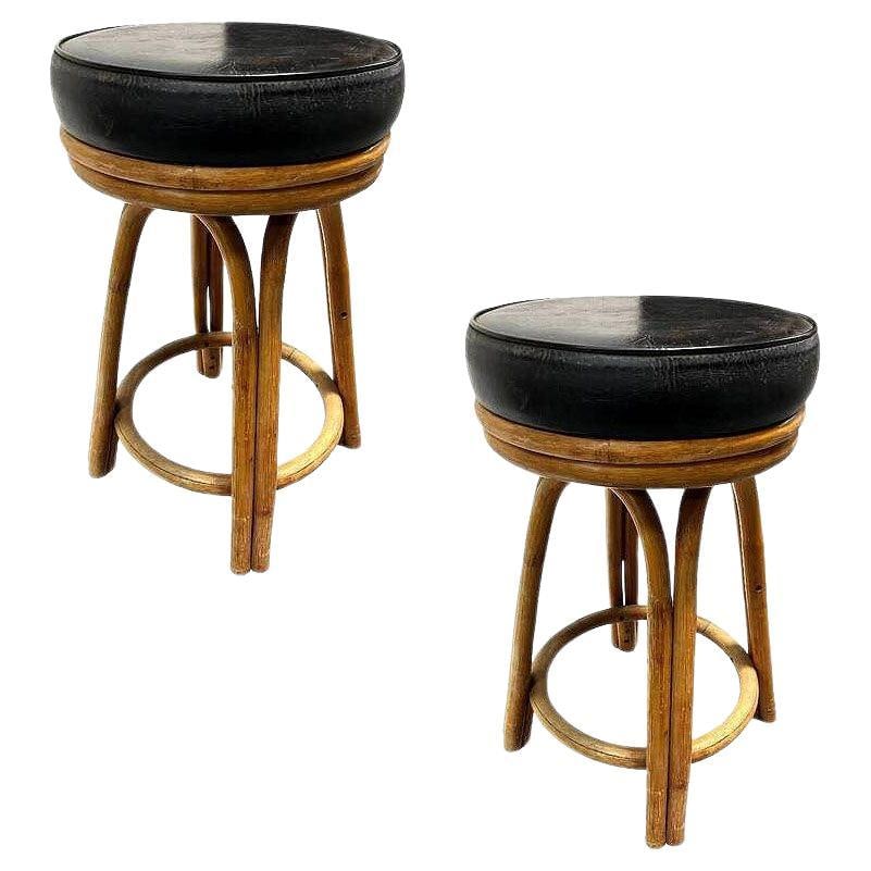 Restored Rattan Double Stand Arched Barstool w/ Black Naugahyde seat, Pair: Title: Restored Rattan Double Stand Arched Barstool w/ Black Naugahyde seat, Pair Description: This beautifully restored Paul Frankl-inspired pair of 1950s double-strand "Arched" Rattan bar stools