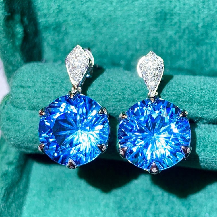 14K GOLD 13.10 CTW NATURAL TOPAZ & DIAMOND EARRINGS: Title:14K GOLD 13.10 CTW NATURAL TOPAZ & DIAMOND EARRINGS Description:Ref:230528652Gold Content:14K GoldMain Gemstone:TopazNumber of stones:2Shape:RoundCarat Weight:13ct Color:Swiss blueTreatment:Natu